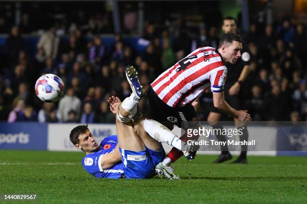 Krystian Bielik of Birmingham City is tackled by Corry Evans of Sunderland during the Sky Bet Championship between Birmingham City and Sunderland at...