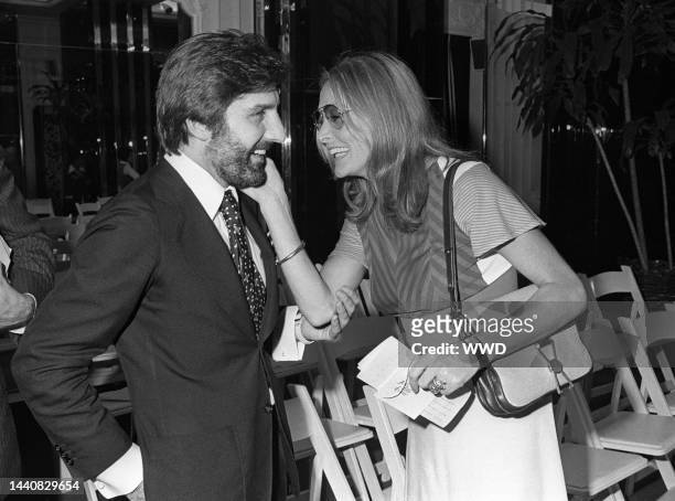 Designer Emanuel Ungaro with Elga Andersen at a Saks Fifth Avenue presentation of Ungaro's Fall 1974 show to benefit the Women's Hospital at St....
