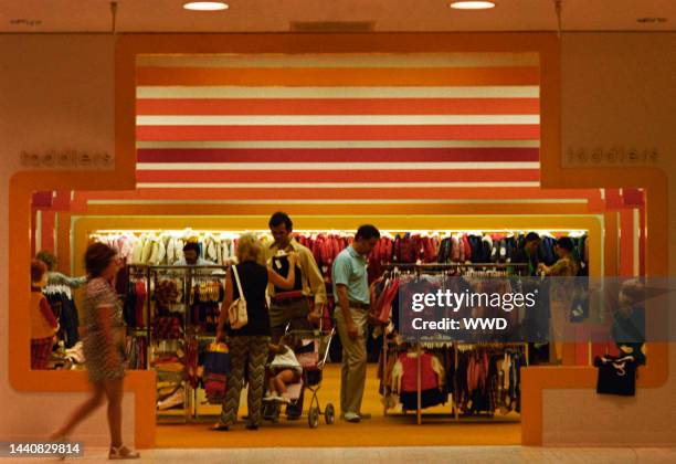 People shopping for children's clothes at Bloomingdales department store