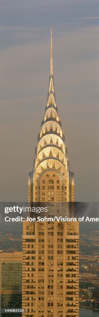 This is a close up of the Chrysler Building at sunset. It is the view from 42nd Street and 5th Avenue.