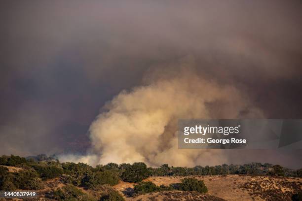 Calfire control burn in the hills near Los Alamos is viewed on October 11 in Los Alamos, California. Because of its close proximity to Southern...