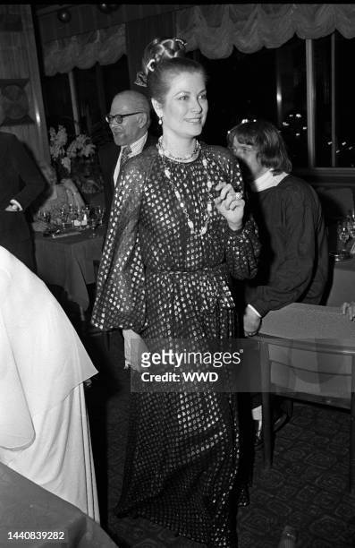 American actress Grace Kelly attending Elizabeth Taylor's fortieth birthday party weekend