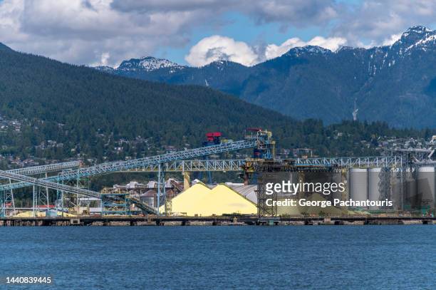 big pile of sulphur on the harbor - hill station stock pictures, royalty-free photos & images