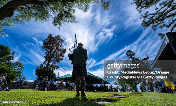 Lake Forest, CA Bagpiper Richard Cook of Tustin plays Amazing Grace during the 33rd annual Veterans Day observance at El Toro Memorial Park in Lake...