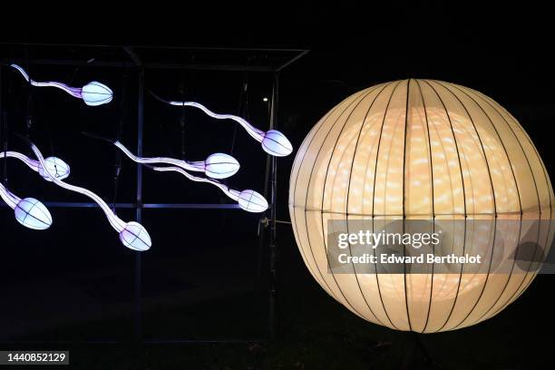 Luminous lantern depicting sperm fertilizing an egg, is displayed during the "Mini-Mondes En Voie D'Illumination - Mini Worlds On The Way To...