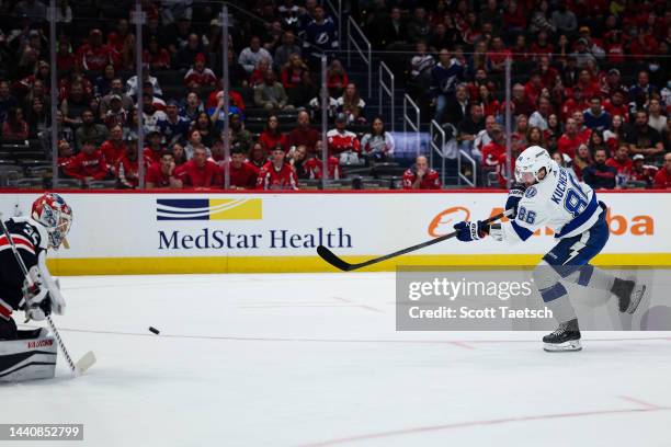 Nikita Kucherov of the Tampa Bay Lightning shoots the puck against Darcy Kuemper of the Washington Capitals on a breakaway against the Washington...