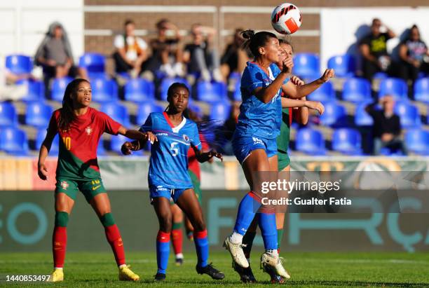 Claire Constant of Haiti with Vanessa Marques of Portugal in action during the Women's International Friendly match between Portugal and Haiti at...