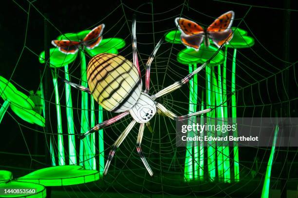 Luminous lantern depicting a spider is displayed during the "Mini-Mondes En Voie D'Illumination - Mini Worlds On The Way To Illumination” exhibition...