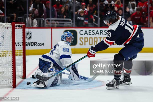 Sonny Milano of the Washington Capitals scores a goal against Andrei Vasilevskiy of the Tampa Bay Lightning during the second period of the game at...