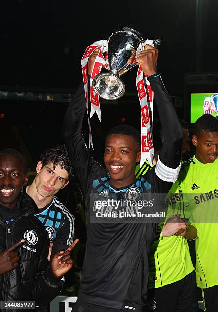 Nathaniel Chalobah captain of Chelsea holds the trophy aloft after victory against Blackburn Rovers during the FA Youth Cup Final 2nd leg match...
