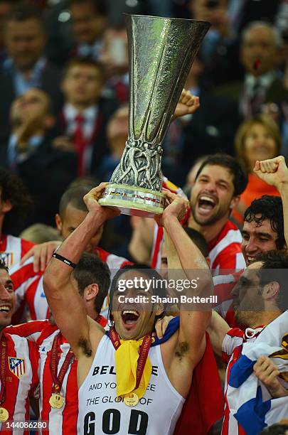 Radamel Falcao of Atletico Madrid holds the trophy aloft with his team mates at the end of the UEFA Europa League Final between Atletico Madrid and...