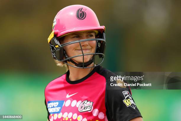 Ellyse Perry of the Sixers leaves the field after being dismissed by Sophie Day of the Stars during the Women's Big Bash League match between the...