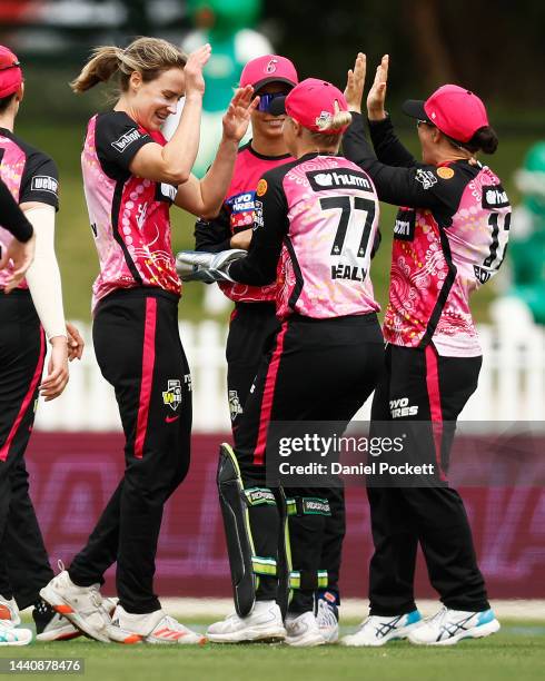 Ellyse Perry of the Sixers celebrates the dismissal of Lauren Winfield-Hill of the Stars during the Women's Big Bash League match between the...