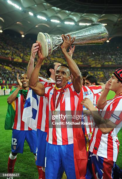 Luis Amaranto Perea of Atletico Madrid holds the trophy aloft at the end of the UEFA Europa League Final between Atletico Madrid and Athletic Bilbao...