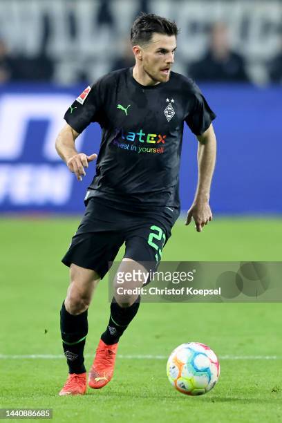 Jonas Hofmann of Moenchengladbach runs with the ball during the Bundesliga match between Borussia Mönchengladbach and Borussia Dortmund at...