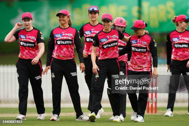 The Sixers celebrate winning the Women's Big Bash League match between the Melbourne Stars and the Sydney Sixers at CitiPower Centre, on November 12...