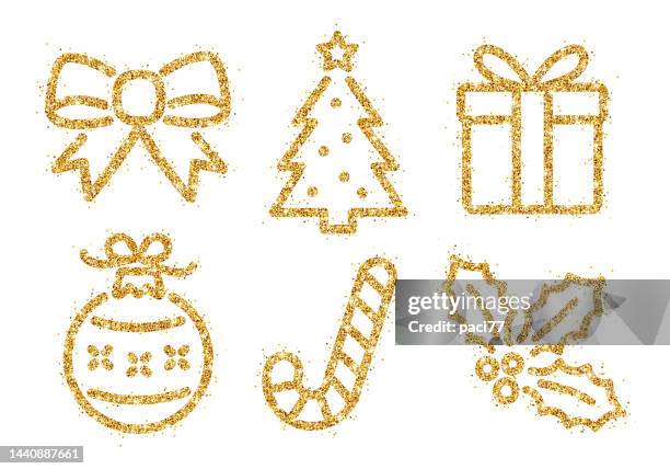 golden glitter christmas symbols on white background - candy cane stock illustrations