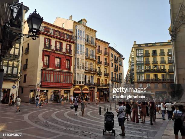 people walking in the casco viejo of bilbao, spain - bilbao stock pictures, royalty-free photos & images