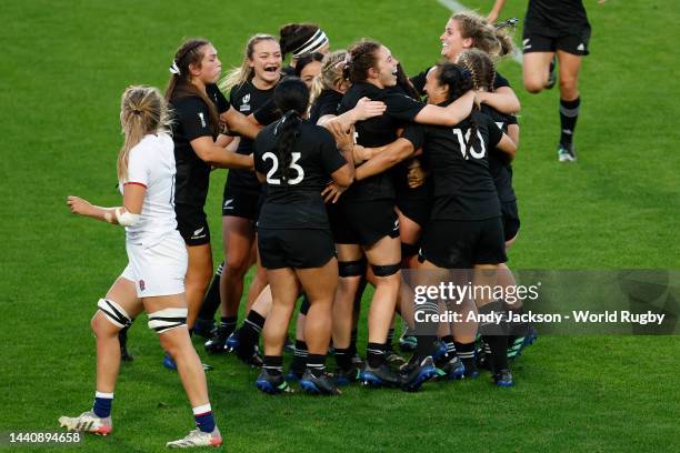 Georgia Ponsonby of New Zealand celebrates with teammates after scoring a try during the Rugby World Cup 2021 Final match between New Zealand and...