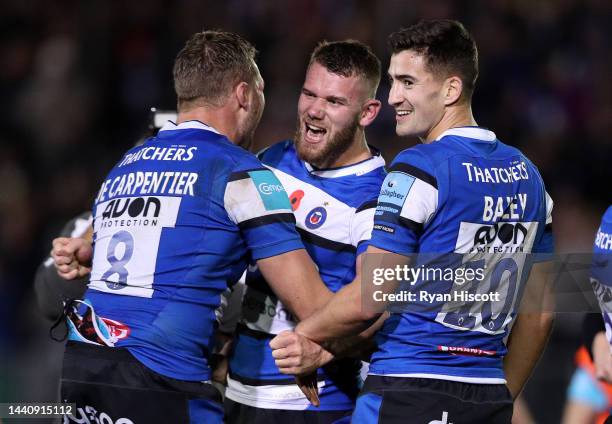 Will Butt of Bath Rugby celebrates their side's win with teammates Richard de Carpentier and Orlando Bailey after the final whistle of the Gallagher...