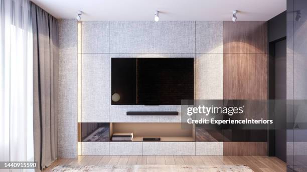 apartment wall with large television screen - tv on wall stock pictures, royalty-free photos & images