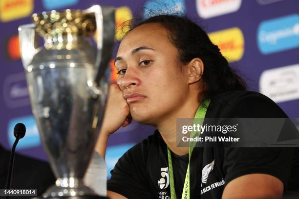 Ruahei Demant of New Zealand looks at the trophy during a press conference after the Rugby World Cup 2021 Final match between New Zealand and England...