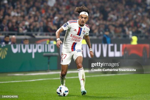 Malo Gusto of Olympique Lyonnais controls the ball during the Ligue 1 match between Olympique Lyonnais and OGC Nice at Groupama Stadium on November...