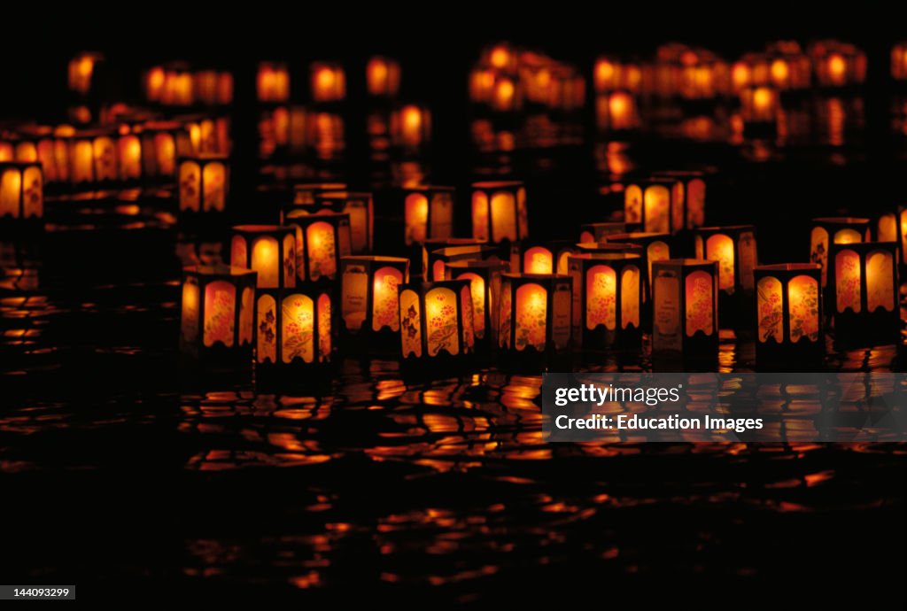 Hawaii, Haleiwa, Japanese Prayer Lanterns Floating Out To Sea At The Haleiwa Japanese Bon Dance Festival.