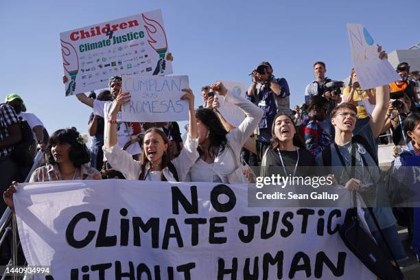 Protesters demonstrate over climate justice, loss and damage, fossil fuels, human rights, exploitation by rich countries of poor countries and other...