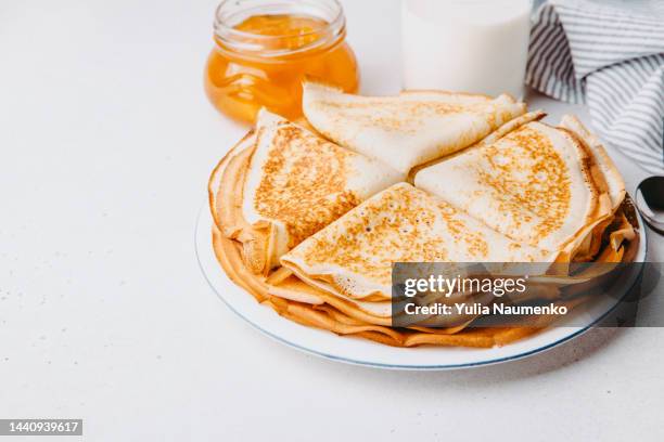 french pancakes, plate of delicious pancakes. - crepe pancake stock pictures, royalty-free photos & images