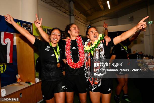 Stacey Fluhler, Ruby Tui and Theresa Fitzpatrick of the New Zealand Black Ferns celebrate in the dressing room after winning the Rugby World Cup 2021...