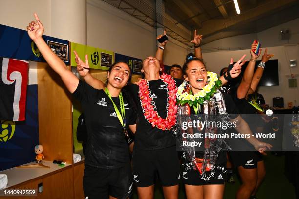 Stacey Fluhler, Ruby Tui and Theresa Fitzpatrick of the New Zealand Black Ferns celebrate in the dressing room after winning the Rugby World Cup 2021...