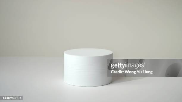 white podium on white background - sports round stock-fotos und bilder