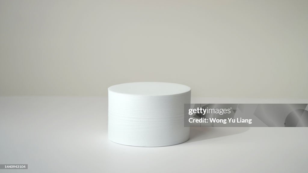 White podium on white background