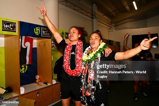 Ruby Tui and Theresa Fitzpatrick of the New Zealand Black Ferns celebrate in the dressing room after winning the Rugby World Cup 2021 Final match...