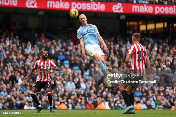 Erling Haaland of Manchester City heads the ball during the Premier League match between Manchester City and Brentford FC at Etihad Stadium on...