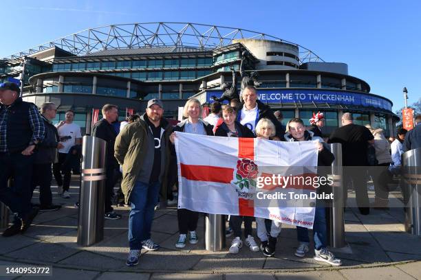 England fans pose for a photo outside the stadium prior to the Autumn Nations Series match between England and Japan at Twickenham Stadium on...