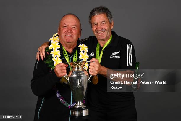 Sir Graham Henry and head coach Wayne Smith of the New Zealand Black Ferns pose for a portrait after winning the Rugby World Cup 2021 final match...