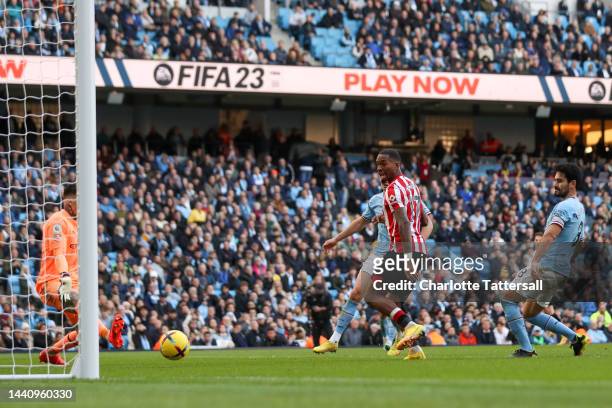 Ivan Toney of Brentford scores their team's second goal during the Premier League match between Manchester City and Brentford FC at Etihad Stadium on...