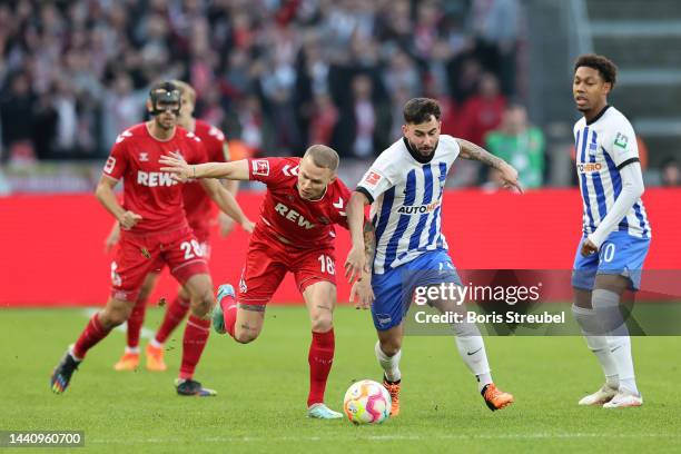 Wilfried Kanga of Hertha BSC competes for the ball with Sargis Adamyan of 1.FC Koln during the Bundesliga match between Hertha BSC and 1. FC Köln at...