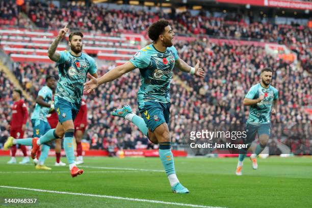 Che Adams of Southampton celebrates after scoring their team's first goal during the Premier League match between Liverpool FC and Southampton FC at...