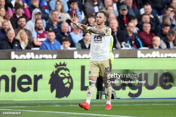 James Maddison of Leicester City celebrates after scoring their first side goal during the Premier League match between West Ham United and Leicester...