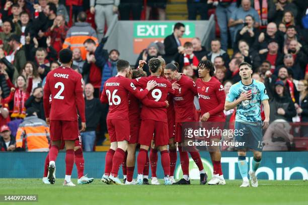 Darwin Nunez of Liverpool celebrates with teammates after scoring their team's second goal during the Premier League match between Liverpool FC and...