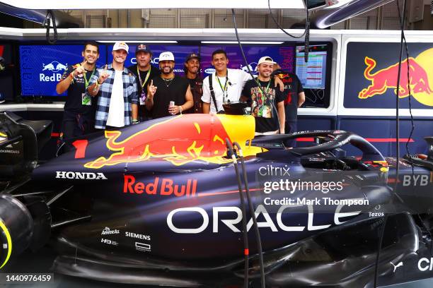 Lucas Moraes, Lucas Rabelo, Pedro Caldas, Caca Bueno, Bruno Crivilin, Marcos Casteluber and Italo Ferreira pose for a photo in the Red Bull Racing...