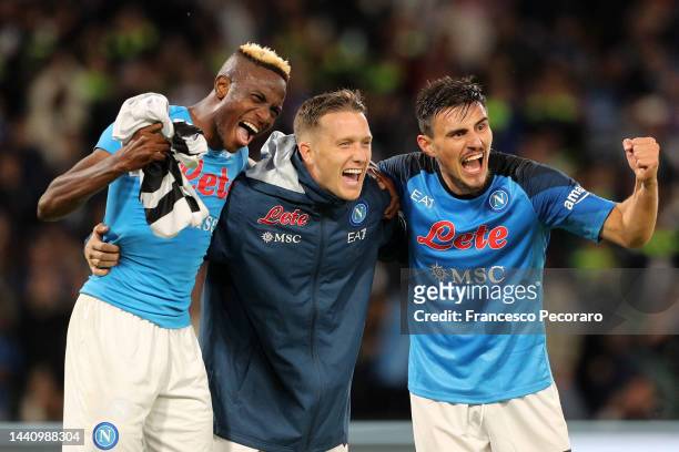 Victor Osimhen, Piotr Zielinski and Eljif Elmas of SSC Napoli celebrate the victory after the Serie A match between SSC Napoli and Udinese Calcio at...
