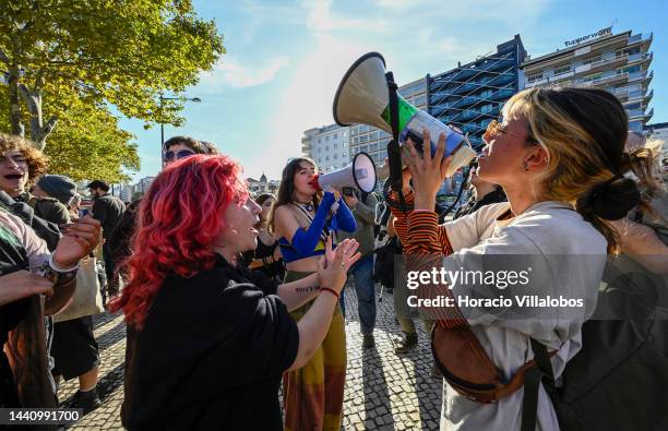 Demonstrators chant at the rally convened by the Coalition "Unir contra o Fracasso Climático" , which brings together several Portuguese...