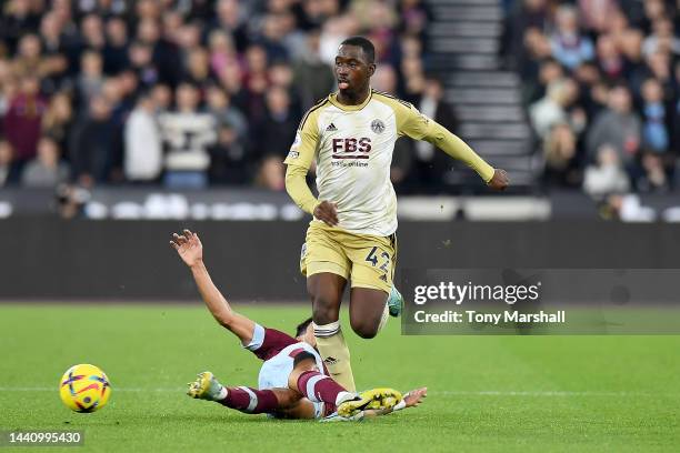 Lucas Paqueta of West Ham United competes for the ball with Boubakary Soumare of Leicester City during the Premier League match between West Ham...