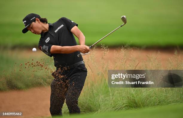 Min WomLee of Australia plays his bunker shot on the 14th hole during the third round during Day Three of the Nedbank Golf Challenge at Gary Player...