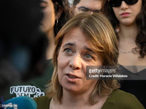 Portuguese Parliamentarian and coordinator of Bloco de Esquerda party Catarina Martins talks to journalists at the rally convened by the Coalition...