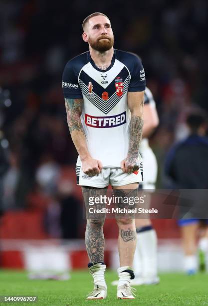 Sam Tomkins of England looks dejected following their side's defeat in the Rugby League World Cup Semi-Final match between England and Samoa at...